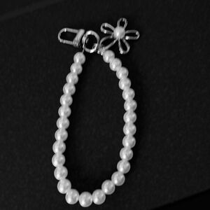 5️⃣ Elegant Pearl Bracelet with Flower Clasp